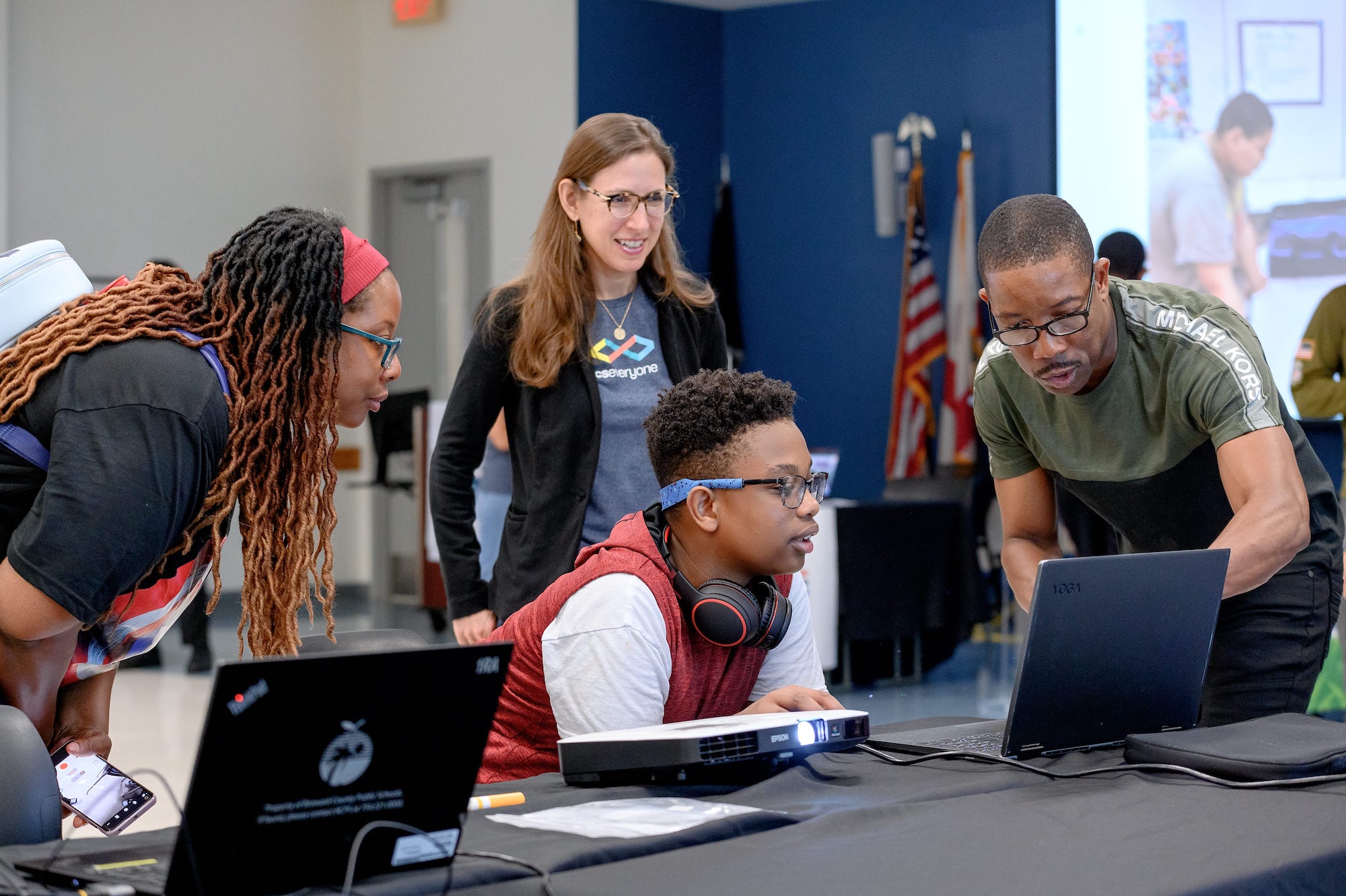 Ed tech students in a lecture in a conference room