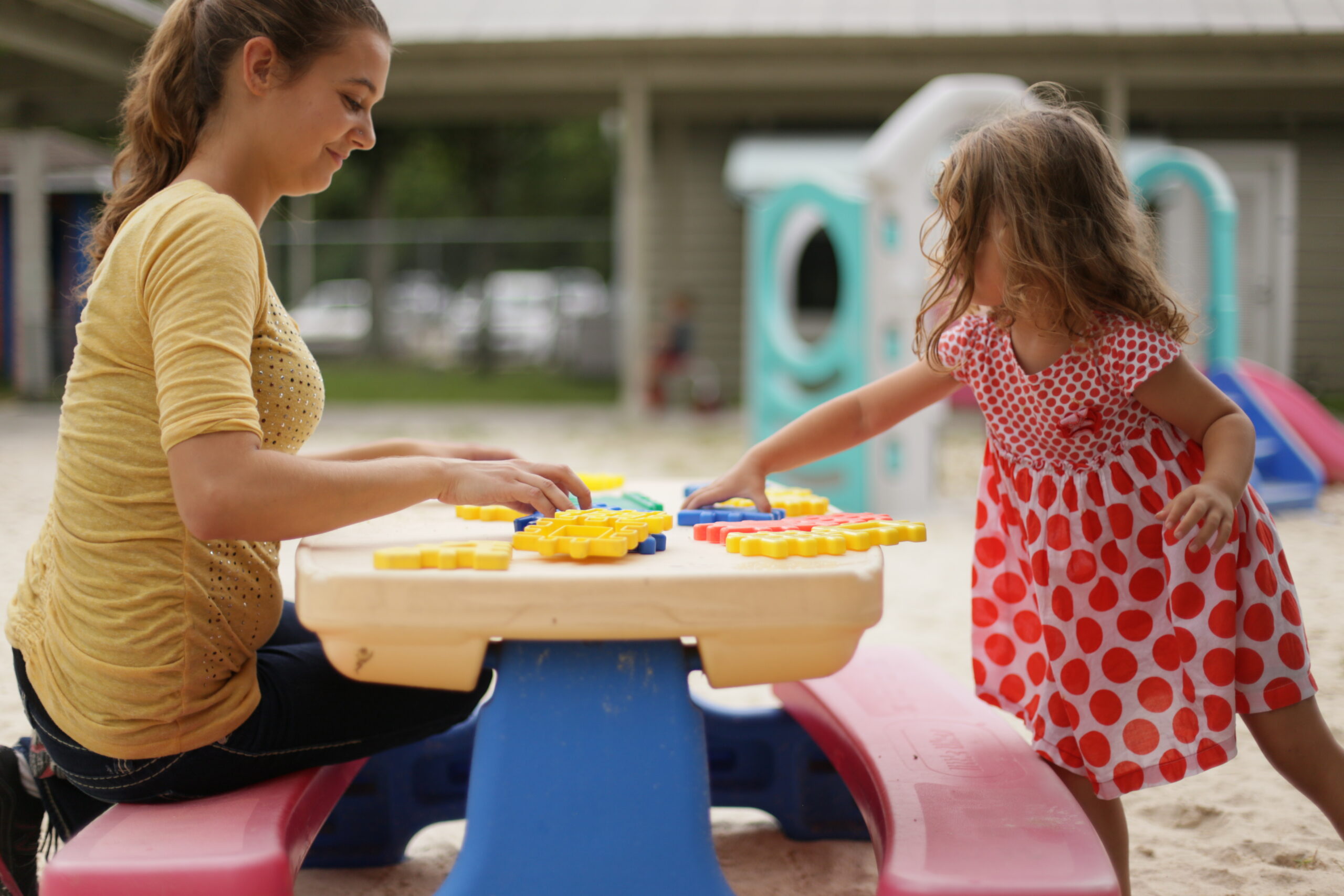 Teacher working with Student at Santa Fe Little School