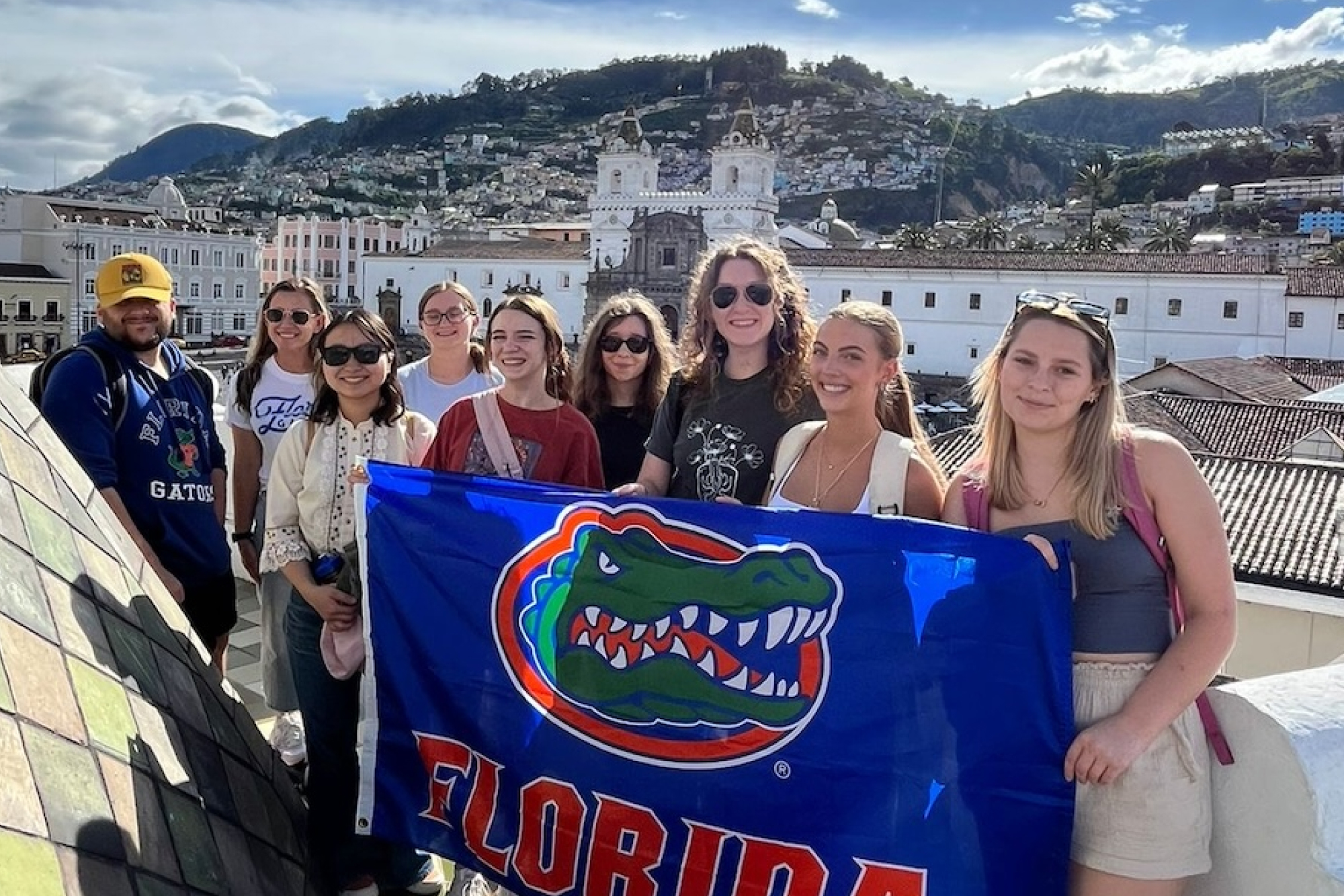 Learners with gator flag in Galapagos
