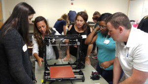 Dr. Antonenko’s PhD student Claudia Grant and PK Yonge teachers Taylor Whitley, Mayra Cordero, Tredina Sheppard, and Rudy Simpson assemble a 3D printer for the iDigFossils project.
