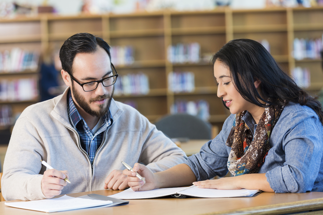 Students working together in library