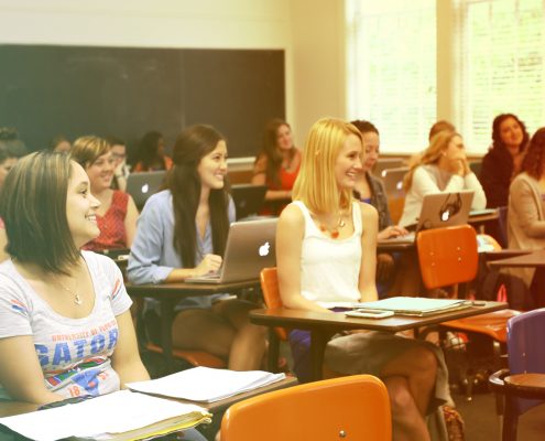 A group of students in a classroom.