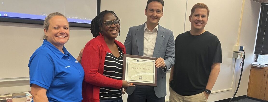 HDOSE faculty receiving award.