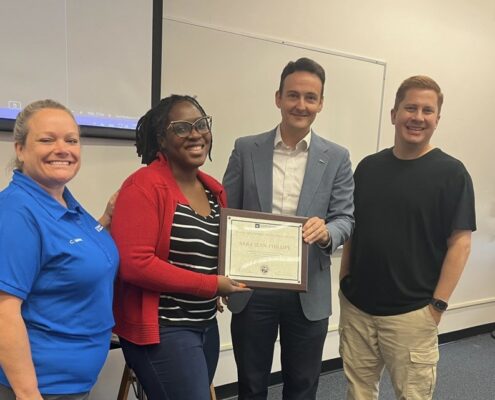 HDOSE faculty receiving award.