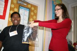 picture of Julianne Scherker with student during science lesson