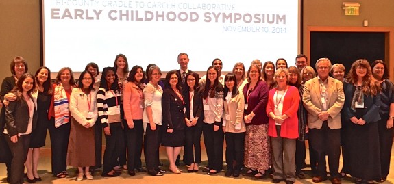 Posing for a group shot are some of the 40 participants from the College of Education and other UF colleges at the Early Child Symposium Nov. 11 in Charleston.