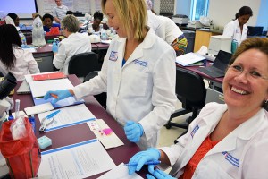 Secondary science teachers Wendy Vidor and Carlene Rogers get first-hand training in UF laboratories that they can pass on to their students