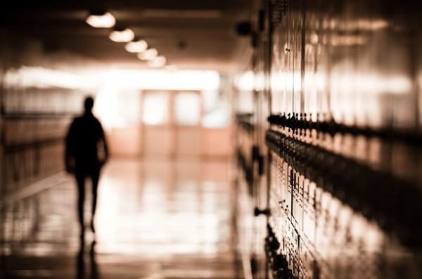 A person in a school hallway.