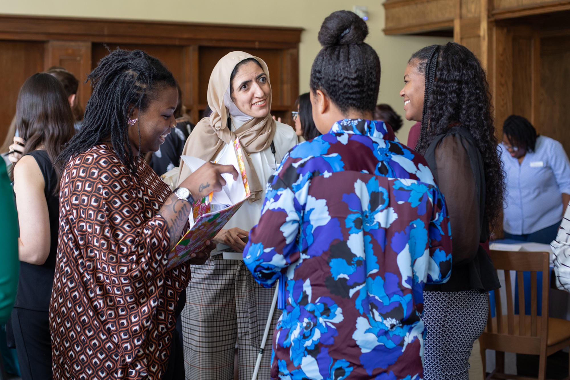 Special education Ph.D. candidates talking to each other